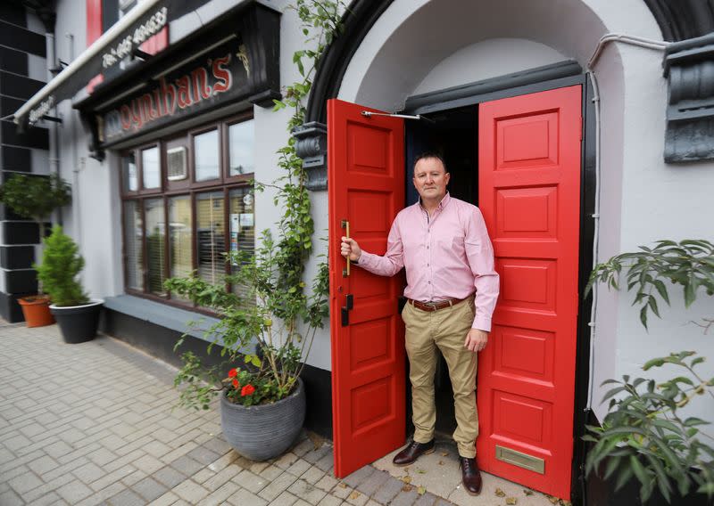 Publican Paul Moynihan prepares for reopening his pub in Donard, County Wicklow, Ireland