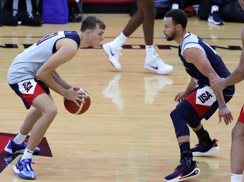 LAS VEGAS, NV - JULY 8: Cooper Flagg (#31) of the 2024 USA Men's Basketball National Team is guarded by Stephen Curry (#4) of the 2024 USA Men's Basketball National Team during a scrimmage during a practice session at the team's training camp at UNLV Mendenhall Center in Las Vegas, Nevada. (Photo by Ethan Miller/Getty Images)