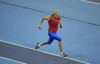 2016 Rio Olympics - Athletics - Preliminary - Women's Long Jump Qualifying Round - Groups - Olympic Stadium - Rio de Janeiro, Brazil - 16/08/2016. Darya Klishina (RUS) of Russia warms up. REUTERS/Dominic Ebenbichler