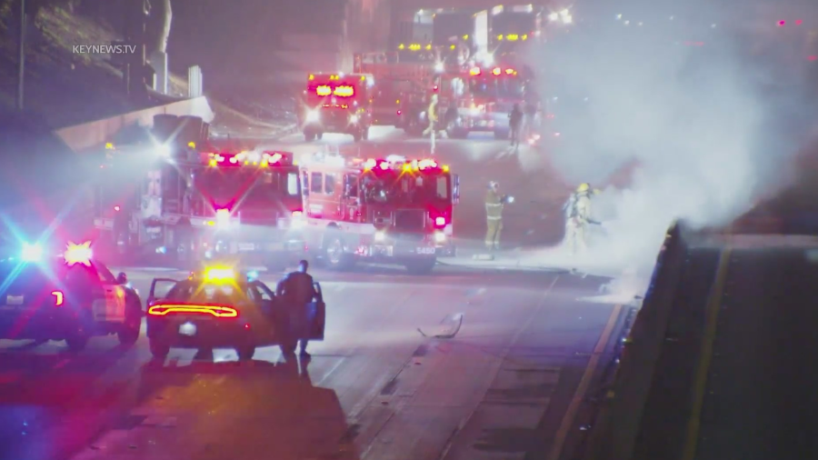 Emergency crews respond to a fatal crash on the 5 Freeway in Boyle Heights on Feb. 27, 2024.
