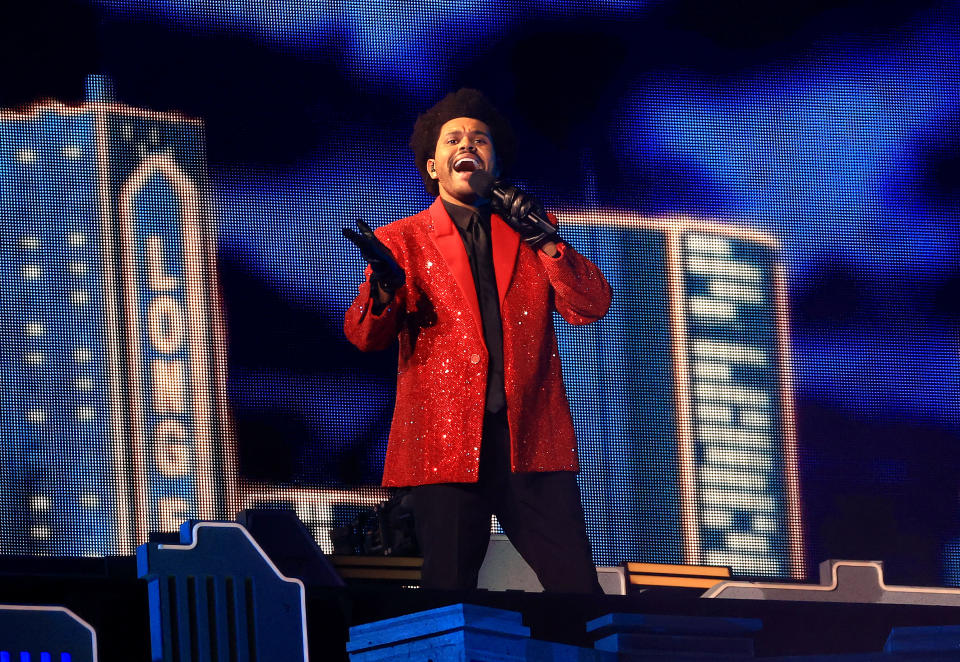 <p>TAMPA, FLORIDA - FEBRUARY 07: The Weeknd performs during the Pepsi Super Bowl LV Halftime Show at Raymond James Stadium on February 07, 2021 in Tampa, Florida. (Photo by Mike Ehrmann/Getty Images)</p> 