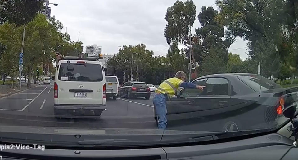 Another motorist jumped out his vehicle to warn the driver of his grave error. Source: Facebook/ Dash Cam Owners Australia