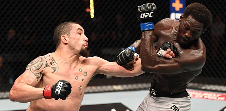 Robert Whittaker cracks Jared Cannonier at UFC 254