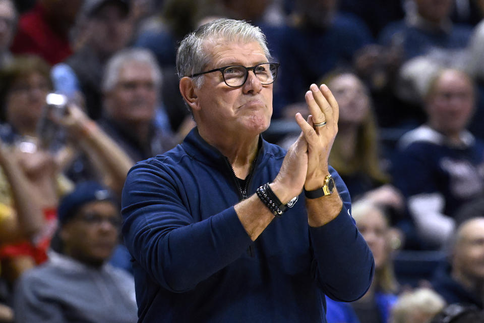 UConn coach Geno Auriemma applauds during the second half of the team's NCAA college basketball game against Maryland, Thursday, Nov. 16, 2023, in Storrs, Conn. (AP Photo/Jessica Hill)