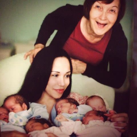 <p>Nadya Suleman/Instagram</p> Nadya Suleman with her mom and eight babies when they were infants in 2009.