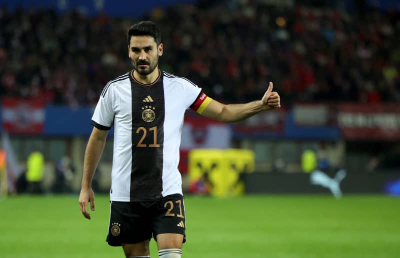 Germany's Ilkay Guendogan gives the thumbs up during the International soccer match between Austria and Germany at Ernst-Happel-Stadion. Ilkay Guendogan expects to remain Germany captain despite the expected return of long-time skipper Manuel Neuer and veteran Toni Kroos. Christian Charisius/dpa