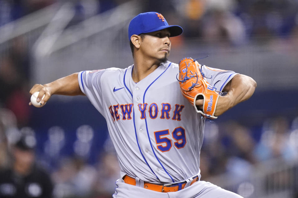 New York Mets starting pitcher Carlos Carrasco throws during the first inning of a baseball game against the Miami Marlins, Wednesday, Aug. 4, 2021, in Miami. (AP Photo/Lynne Sladky)