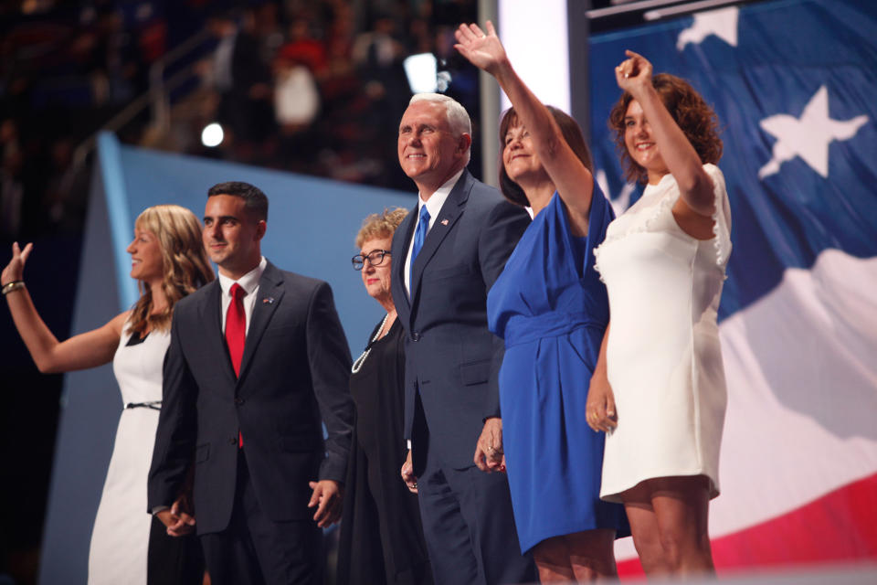 On stage with his family