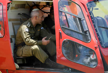 Israeli Colonel Golan Vach is seen inside a rescue helicopter before Israeli military personnel help search for victims of a collapsed tailings dam owned by Brazilian mining company Vale SA,in Brumadinho, Brazil January 28, 2019. REUTERS/Washington Alves