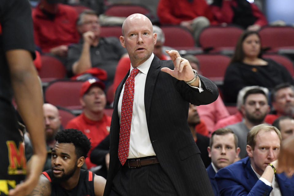 Maryland head coach Kevin Willard signals a play in to his team during the second half of an NCAA college basketball game against Louisville in Louisville, Ky., Tuesday, Nov. 29, 2022. Maryland won 79-54. (AP Photo/Timothy D. Easley)