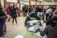 <p>Qualified voters cast a ballot for the Catalan regional election at an elementary school in Barcelona, Spain, Dec. 21, 2017.<br>(Photograph by Jose Colon / MeMo for Yahoo News) </p>