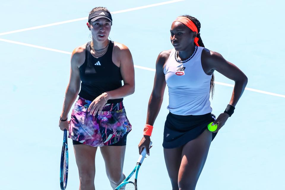 Jan 23, 2023; Melbourne, Victoria, Australia; Coco Gauff (R) and Jessica Pegula from the United States during their round three doubles match against Aldila Sutjiadi of Indonesia and Miyu Kato of Japan on day eight of the 2023 Australian Open tennis tournament at Melbourne Park. Mandatory Credit: Mike Frey-USA TODAY Sports