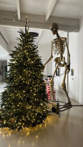 <p>Travis Barker/Instagram</p> Travis Barker shared a photo of his spooky Christmas tree display on his Instagram Story on Monday.