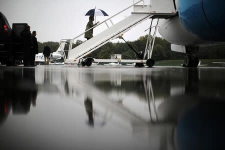 U.S. Democratic presidential candidate Hillary Clinton boards her campaign plane at the Westchester County airport in White Plains, New York, U.S. September 19, 2016. REUTERS/Carlos Barria