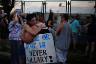 <p>Supporters of Senator Bernie Sanders embrace at the perimeter walls of the 2016 Democratic National Convention in Philadelphia, Pennsylvania, July 26, 2016. (Photo: Adrees Latif/Reuters)</p>