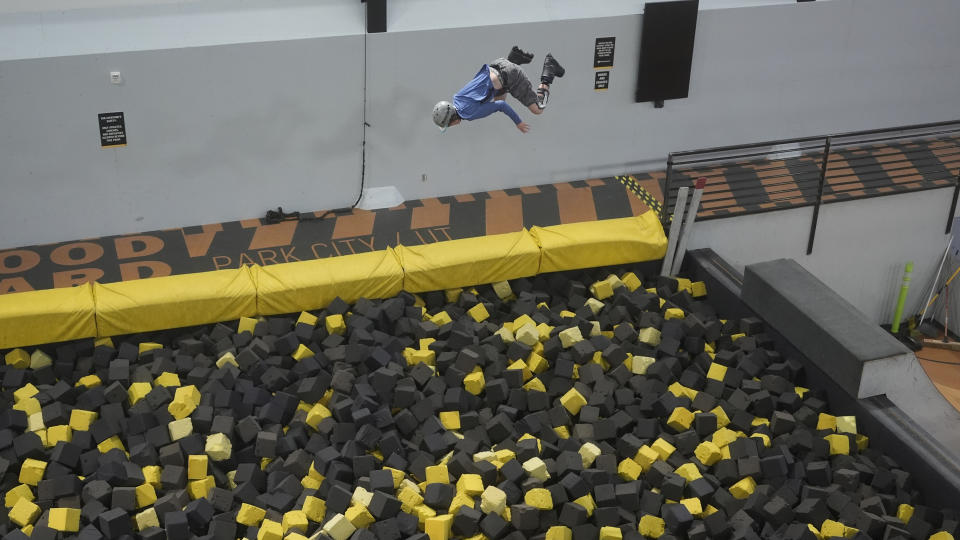 Freestyle skier Jay Riccomini trains at Woodward Park City on May 21, 2024, in Park City, Utah. Riccomini competes in the women's events at World Cup events as a transgender male. He's holding off on taking testosterone until his skiing career is finished. (AP Photo/Rick Bowmer)