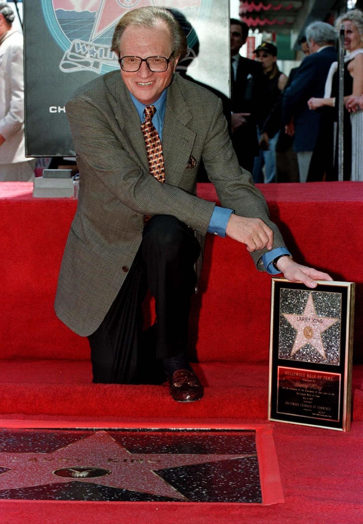 King with his plaque after his star on the Hollywood Walk of Fame was unveiled May 8, 1997. (Photo: Fred Prouser/Reuters)