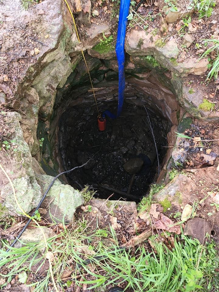 The Dallas County Sheriff's Office says mushroom hunters discovered a body in a well.