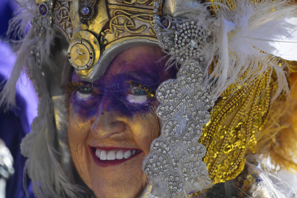 Minnesota Vikings fan Carol Jensen, of Austin, Minn., stands near the main stage ahead of the second round of the NFL football draft, Friday, April 26, 2019, in Nashville, Tenn. (AP Photo/Mike Stewart)