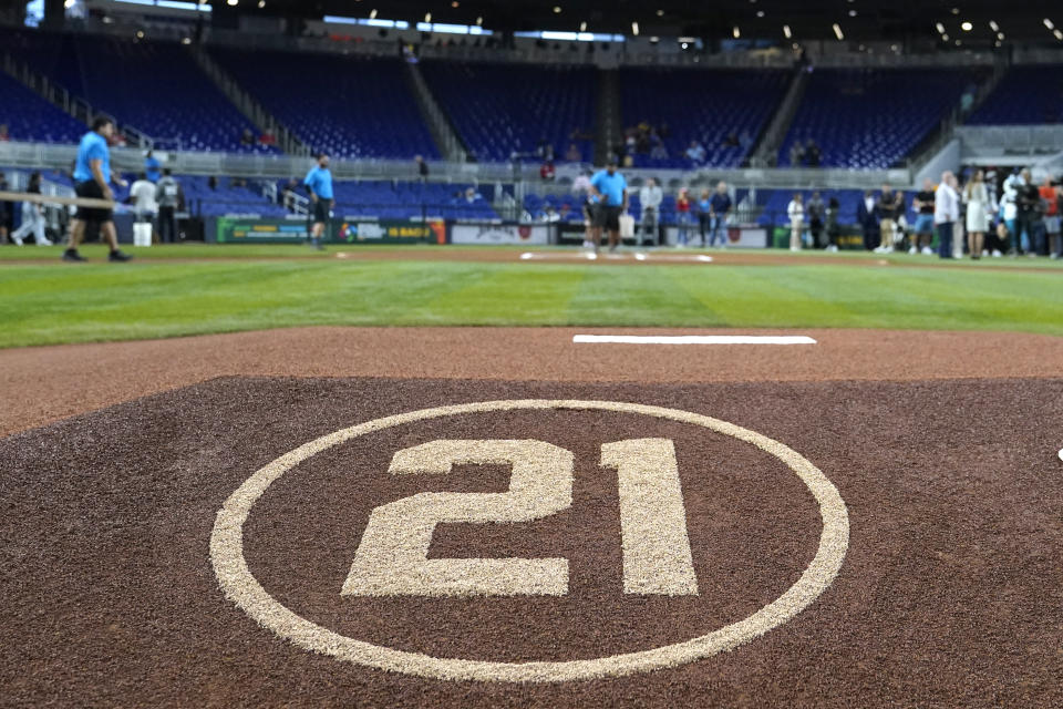 The No. 21 is on the pitching mound in honor of Roberto Clemente Day before a baseball game between the Miami Marlins and the Philadelphia Phillies, Thursday, Sept. 15, 2022, in Miami. (AP Photo/Lynne Sladky)