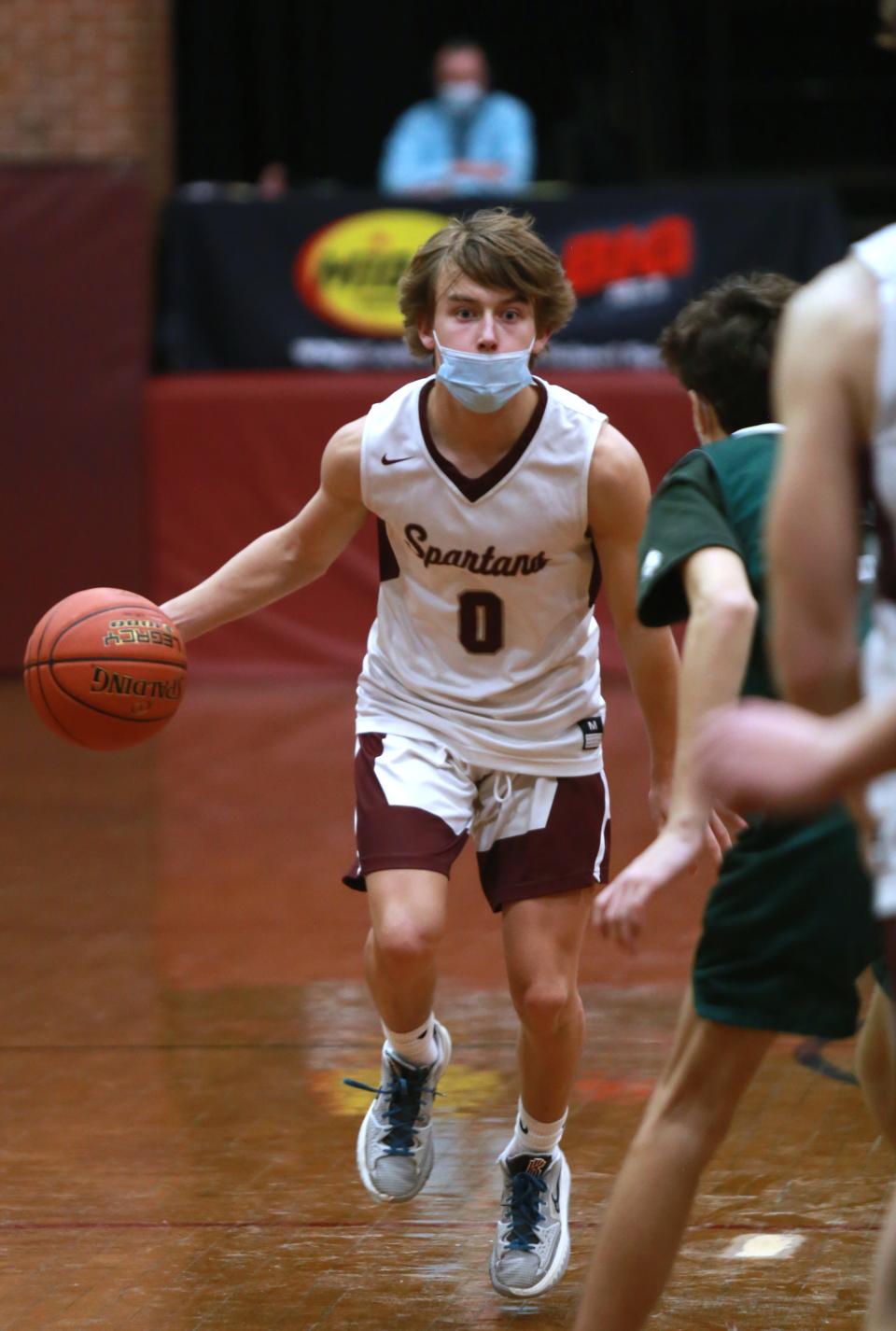 Ben Tingley-Price leads the offense from the point Friday in Bishop Stang's 63-49 win over Dartmouth at the John C. O'Brien Gymnasium.