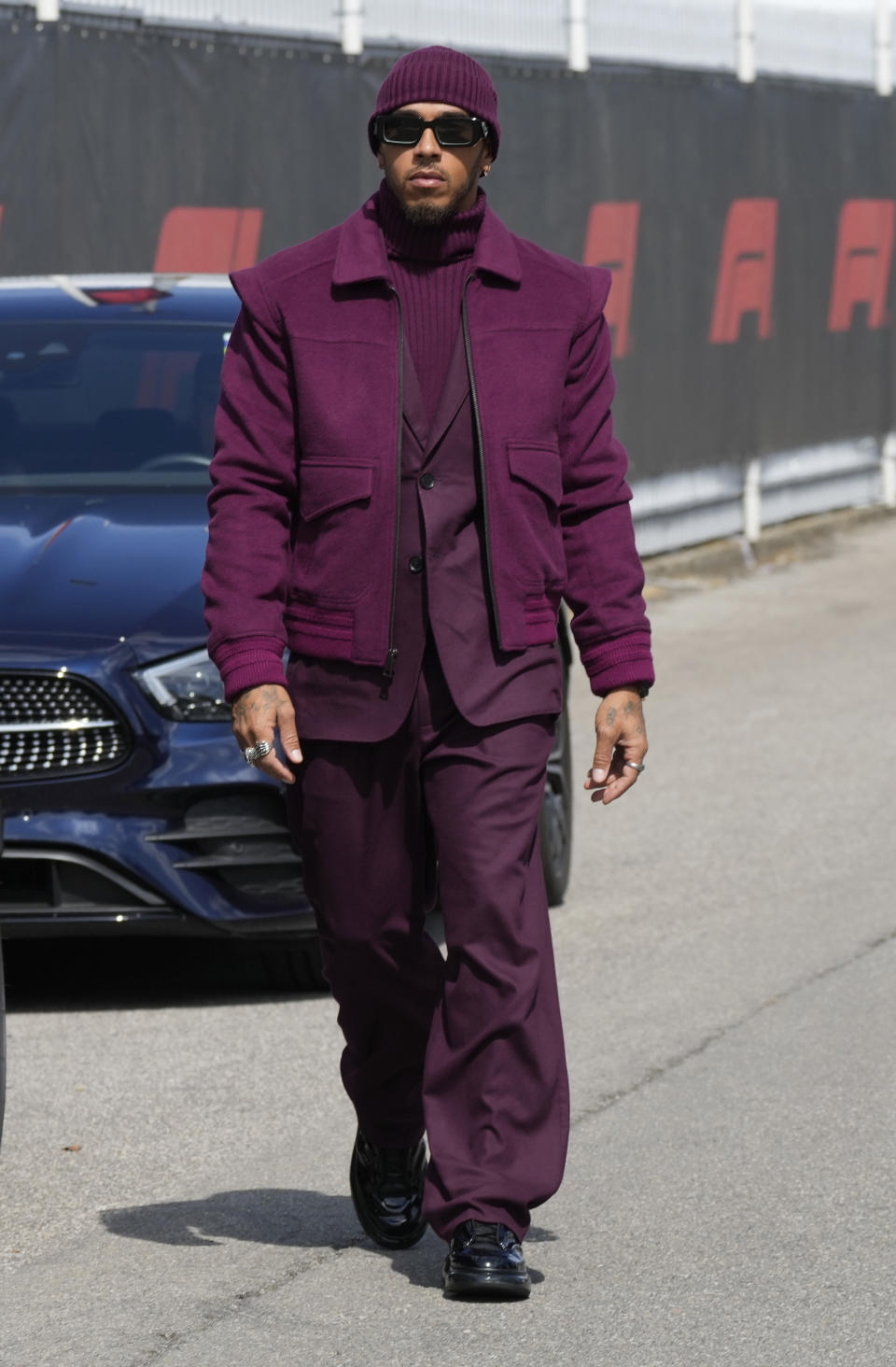 Mercedes driver Lewis Hamilton of Britain arrives at the Monza racetrack, in Monza, Italy, Thursday, Sept. 8, 2022. The Formula one race will be held on Sunday. (AP Photo/Luca Bruno)