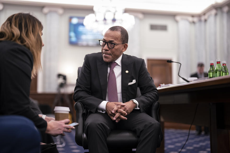 Acting Administrator of the Federal Aviation Administration Billy Nolen confers with his staff before testifying at the Senate Commerce, Science, and Transportation Committee as the panel examines recent failures in the FAA's NOTAM system, at the Capitol in Washington, Wednesday, Feb. 15, 2023. (AP Photo/J. Scott Applewhite)