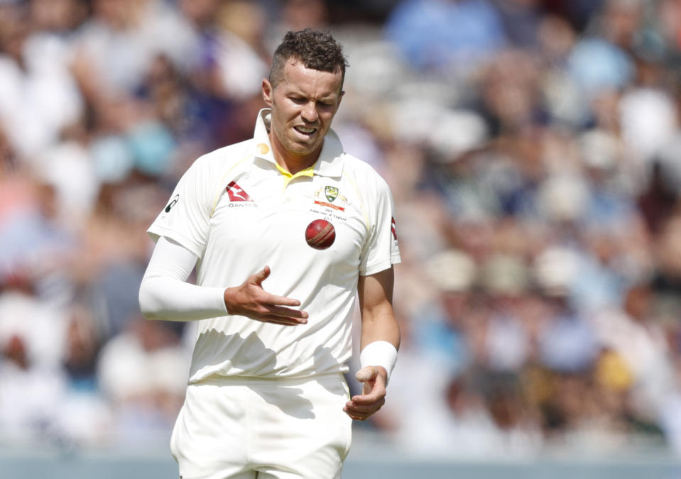 Australia's Peter Siddle prepares to bowl to England's Ben Stokes during play on day five of the 2nd Ashes Test cricket match between England and Australia at Lord's cricket ground in London, Sunday, Aug. 18, 2019. (AP Photo/Alastair Grant)