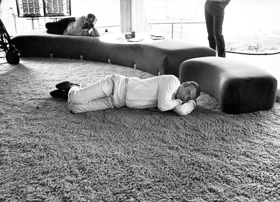 <p>Sean Connery takes a nap during a break from filming <em>Diamonds Are Forever</em></p>