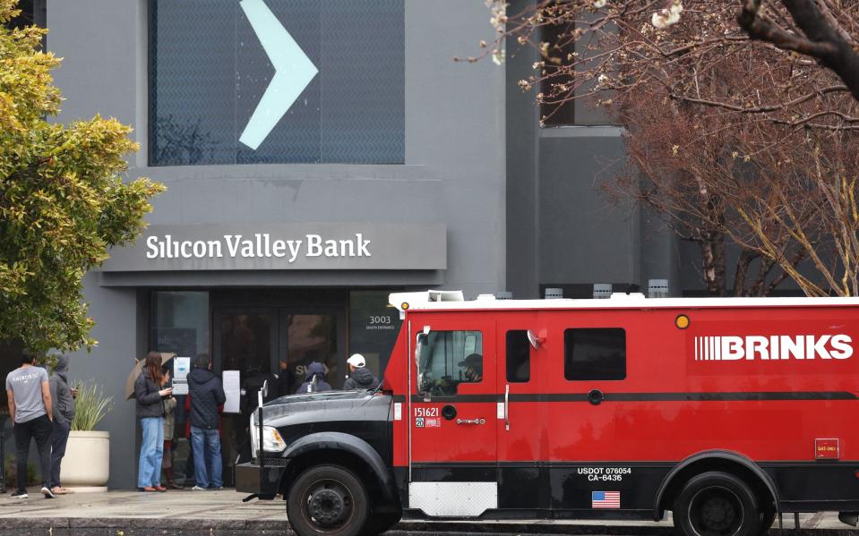 An armoured truck prepares to take away assets of the shuttered Silicon Valley Bank headquarters - Justin Sullivan/Getty Images