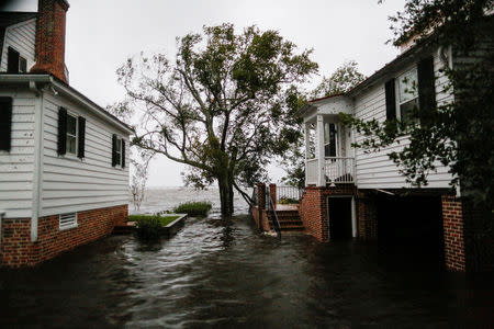 Water from the Neuse river floods the houses during the pass of Hurricane Florence the town of New Bern, North Carolina, U.S., September 14, 2018. REUTERS/Eduardo Munoz