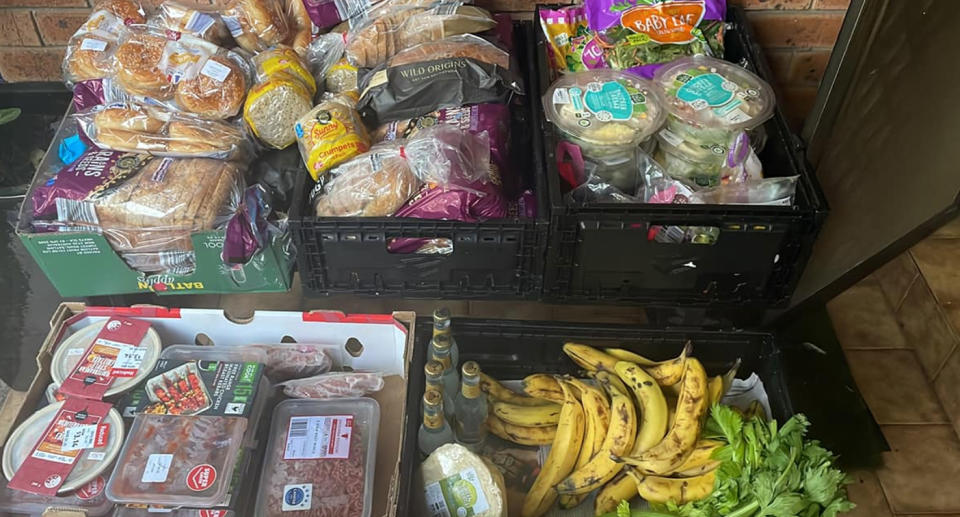 The Sydney man places discarded food found in supermarket bins on his front porch for neighbours to take, despite facing a hefty fine. Source: Facebook