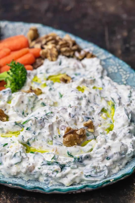 <p>The Mediterranean Dish</p><p>A nutritious version of the classic spinach dip with a tasty Mediterranean twist.</p><p><strong>Get the recipe: <a href="https://www.themediterraneandish.com/spinach-greek-yogurt-dip/" rel="nofollow noopener" target="_blank" data-ylk="slk:Walnut Spinach Greek Yogurt Dip;elm:context_link;itc:0;sec:content-canvas" class="link ">Walnut Spinach Greek Yogurt Dip</a></strong></p>