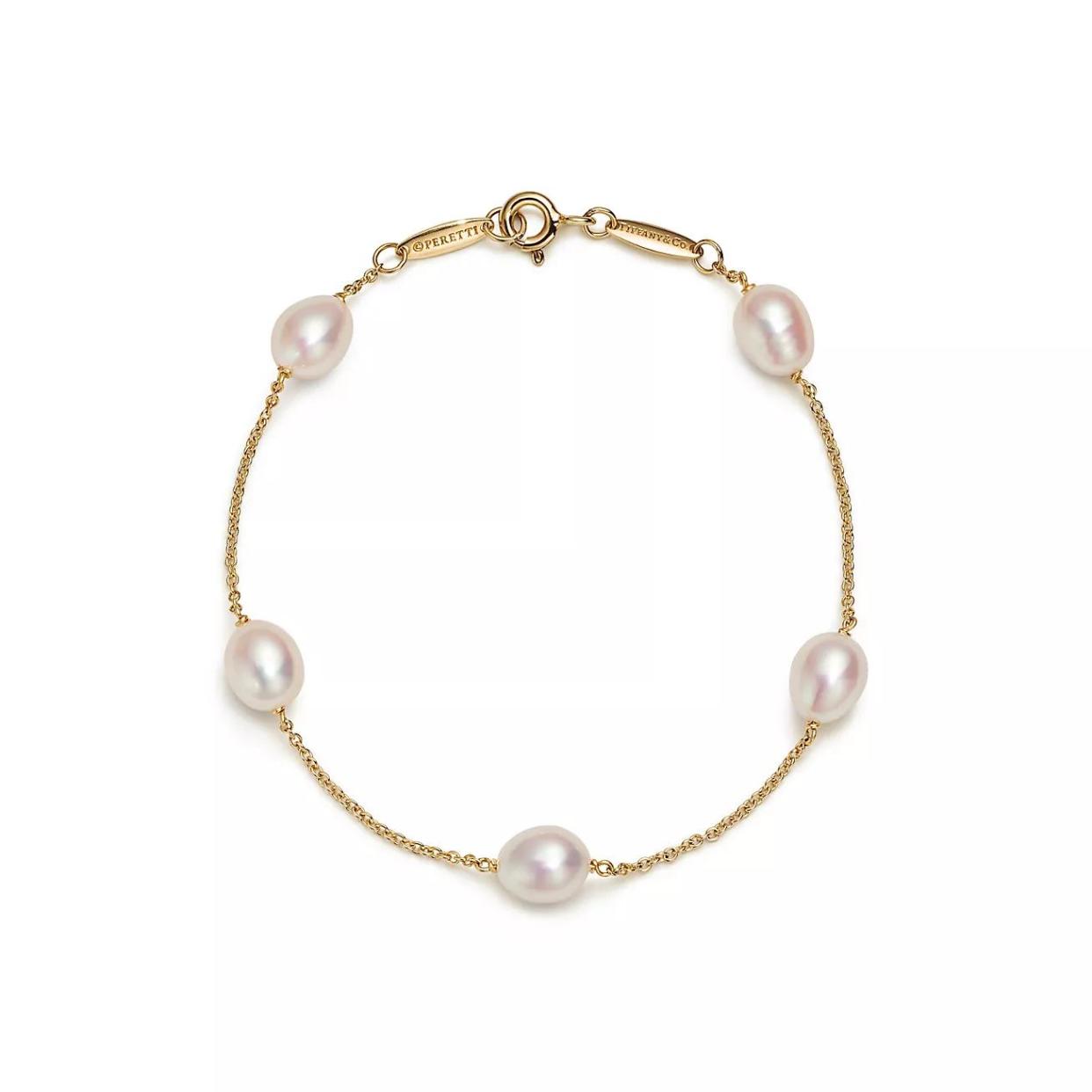 <p><a href="https://www.tiffany.com/jewelry/bracelets/elsa-peretti-pearls-by-the-yard-bracelet-GRP09640/elsa-peretti-pearls-by-the-yard-bracelet-60764042/?omcid=ppc_google_TIFFANY_WJ_USA_NOBRID_FJW_LOW_OGOING_EC_PEMA_GPMA_CRD_USD_N__&mkwid=%7Cpcrid%7C%7Cpkw%7C%7Cpmt%7C%7Cpdv%7Cc%7Cmtid%7C744dpc50313%7Cslid%7C%7Cproductid%7C%7Ctargetids%7C%7Cgroupid%7C%7C&gad_source=1&gclid=CjwKCAiA-vOsBhAAEiwAIWR0TXb-bWhjNwm2PjwFjJdTj88JWpPg6jYoyqIj-pPSrWl5z5JTooVIKxoCTeMQAvD_BwE&gclsrc=aw.ds" rel="nofollow noopener" target="_blank" data-ylk="slk:Shop Now;elm:context_link;itc:0;sec:content-canvas" class="link rapid-noclick-resp">Shop Now</a></p><p>Elsa Peretti Pearls by the Yard Bracelet</p><p>tiffany.com</p><p>$750.00</p>