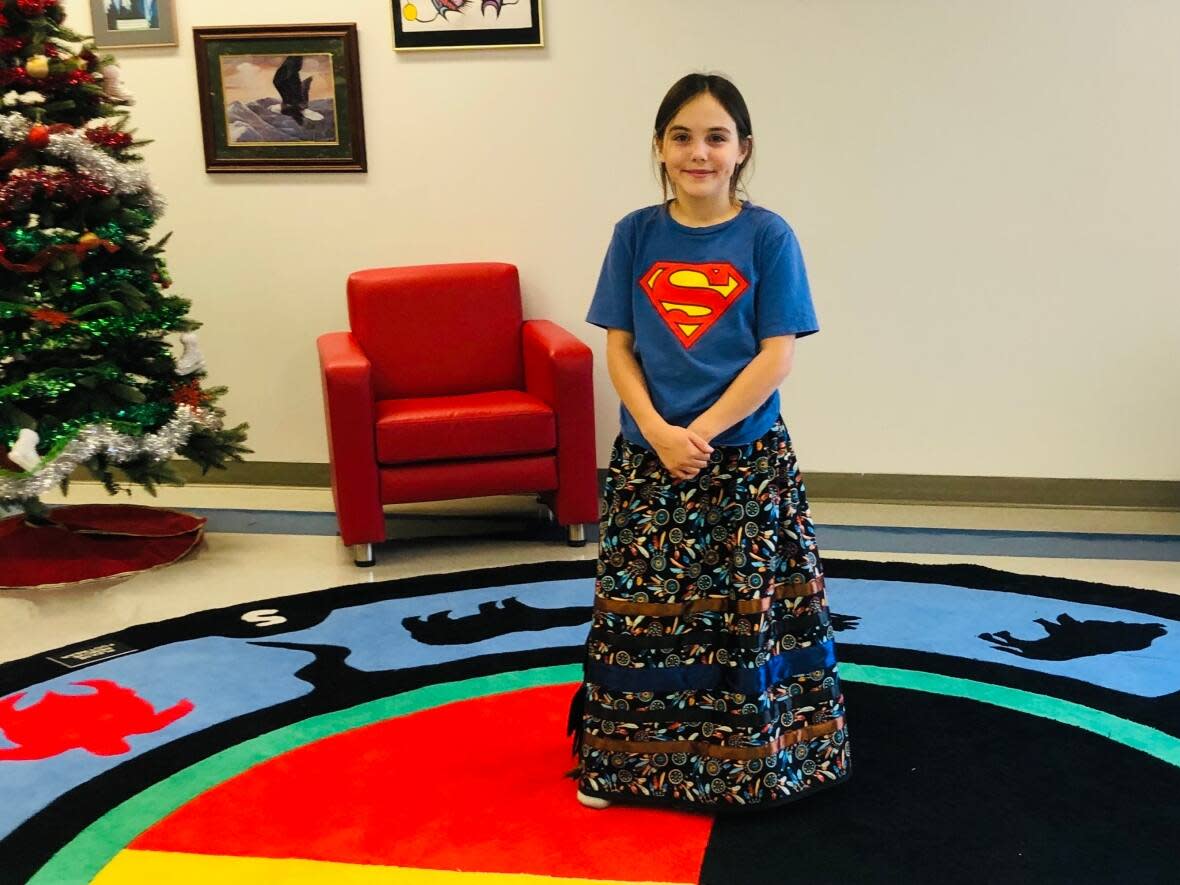 Isabella Kulak in a ribbon skirt she made herself. (Submitted by Lana Kulak - image credit)