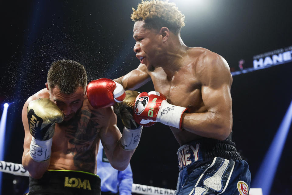 LAS VEGAS, NEVADA - MAY 20: Devin Haney exchanges punches with  Vasyl Lomachenko of Ukraine during their undisputed lightweight title bout at MGM Grand Garden Arena on May 20, 2023 in Las Vegas, Nevada. (Photo by Sarah Stier/Getty Images)