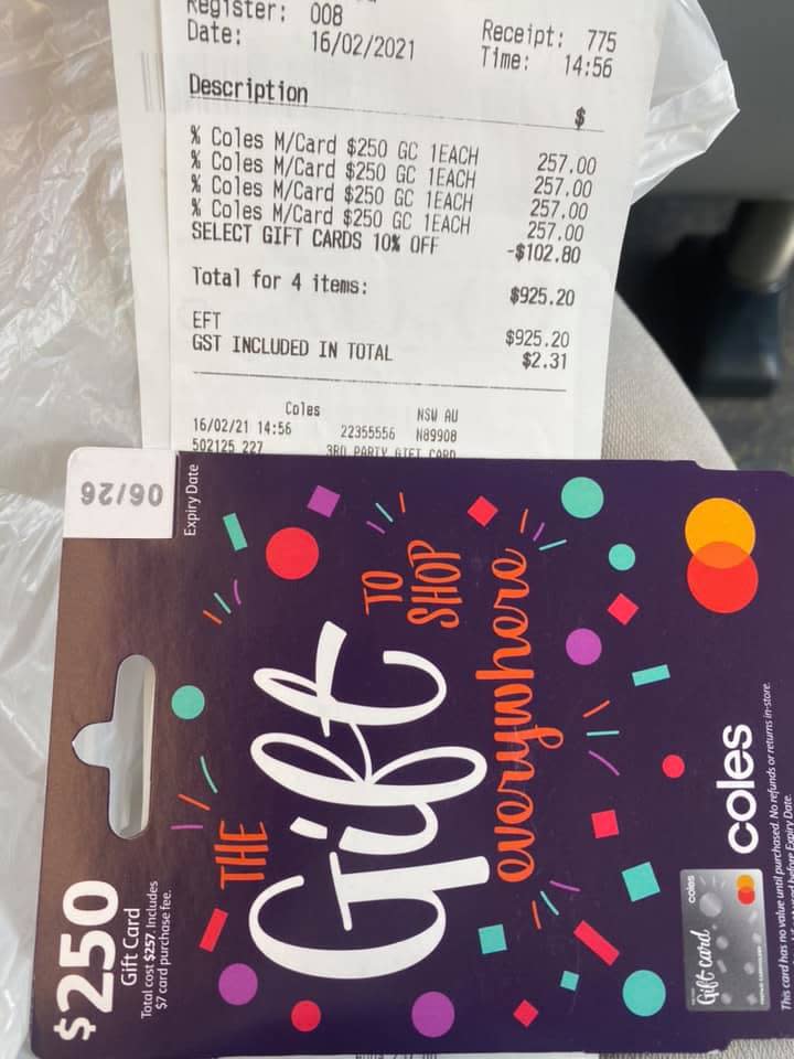 A shopper's recept shows the purchase of four Coles Mastercard gift cards.