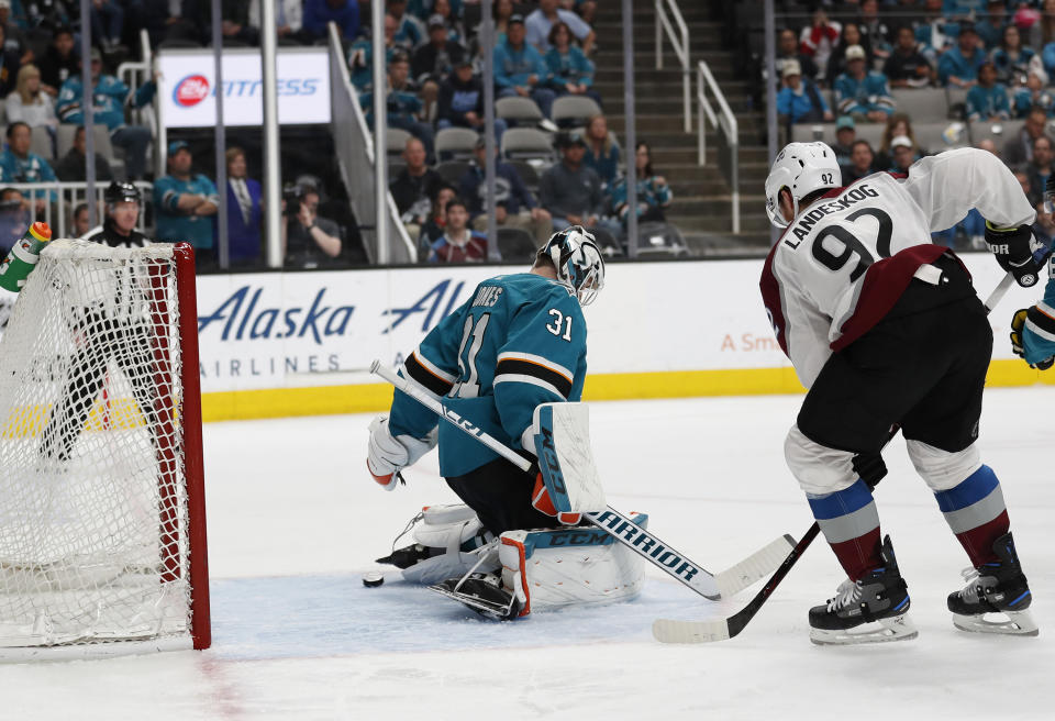 Colorado Avalanche's Colin Wilson (22), not pictured, scores against the San Jose Sharks goaltender Martin Jones (31), with Colorado Avalanche's Gabriel Landeskog (92) in-front of net during the second period of Game 1 of an NHL hockey second-round playoff series at the SAP Center in San Jose, Calif., Friday, April 26, 2019. (AP Photo/Josie Lepe)