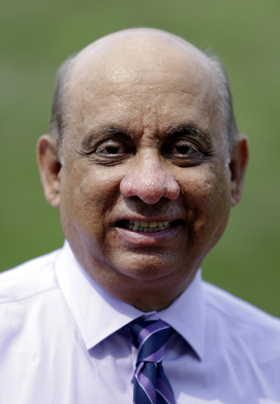 CORRECTS LAST NAME TO SHELAT, NOT SHEBAT, IN SECOND REFERENCE - Kiran Shelat, a 65-year-old retired civil engineer, poses for a portrait in his home, Monday Aug. 6, 2018, in Yardley, Pa. Shelat had spent two years on a kidney transplant waiting list before signing up for a bold experiment with 19 others in which they received organs infected with hepatitis C. A study finds U.S. patients who accepted kidneys infected with hepatitis C were later cured. Results were published Monday in the journal Annals of Internal Medicine. (AP Photo/Jacqueline Larma)