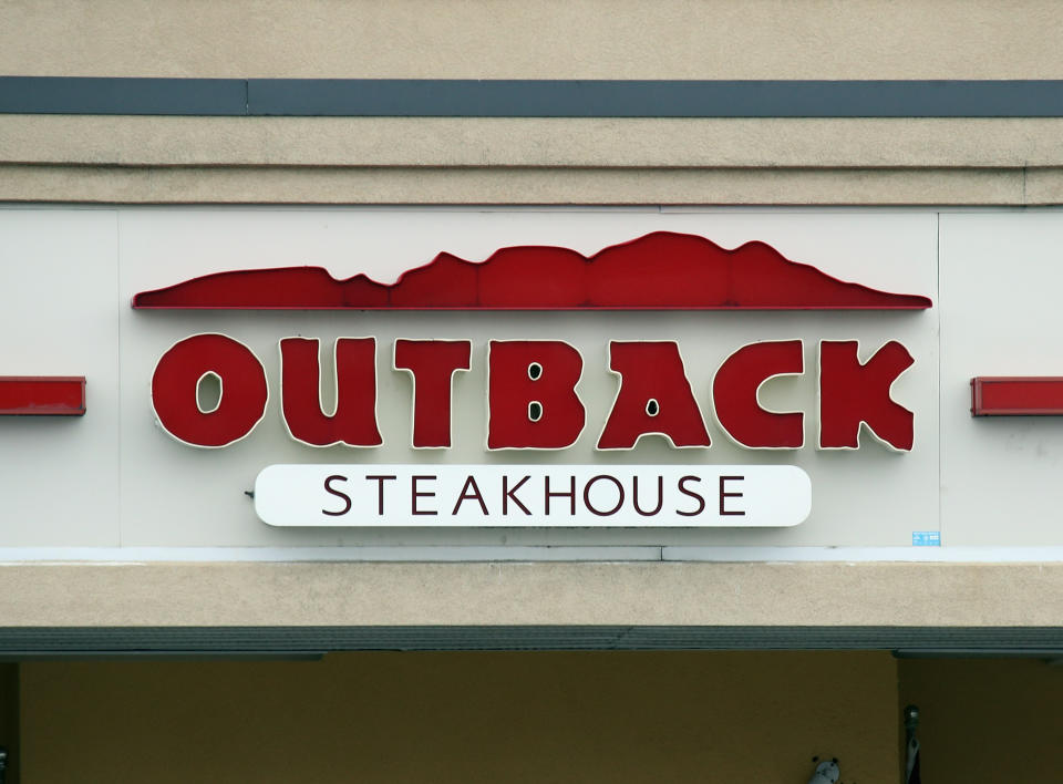 WESTBURY, NEW YORK - MARCH 20: A general view of an Outback Steakhouse sign as photographed on March 20, 2020 in Westbury, New York. (Photo by Bruce Bennett/Getty Images)