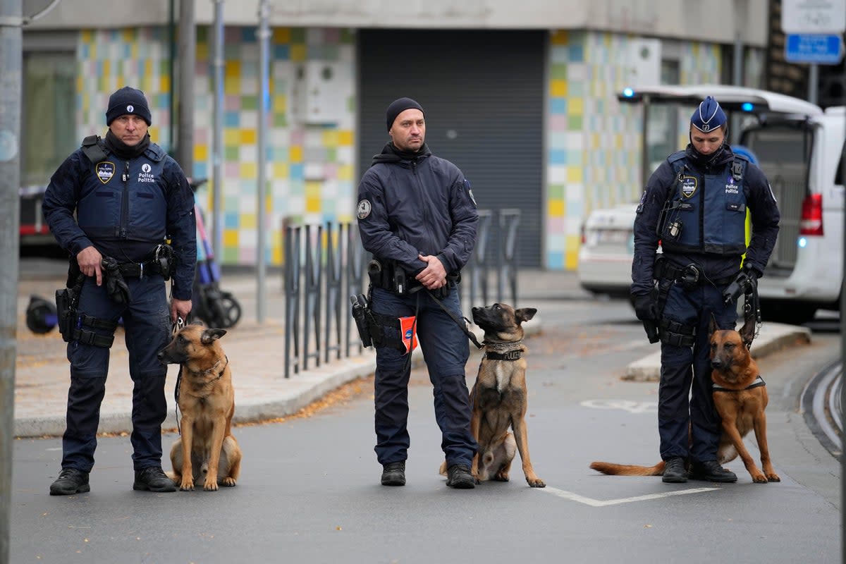 The suspect was shot dead after a manhunt in central Brussels  (AP)