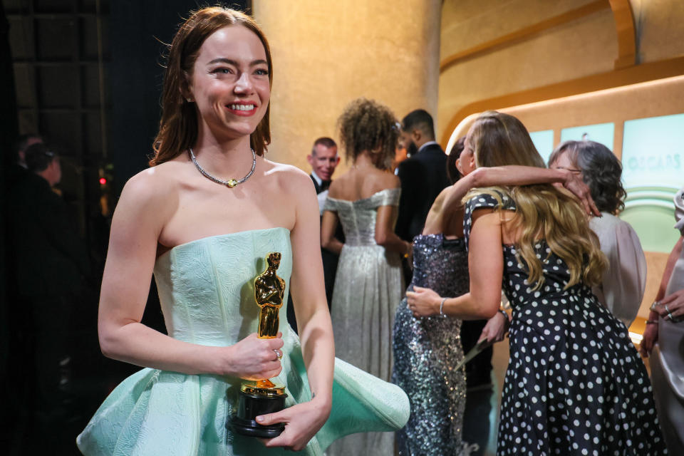 Emma Stone with her Oscar Getty Images)