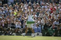 Jul 11, 2018; London, United Kingdom; Novak Djokovic (SRB) celebrates match point during his match against Kei Nishikori (JAP) on day nine at All England Lawn and Croquet Club. Mandatory Credit: Susan Mullane-USA TODAY Sports