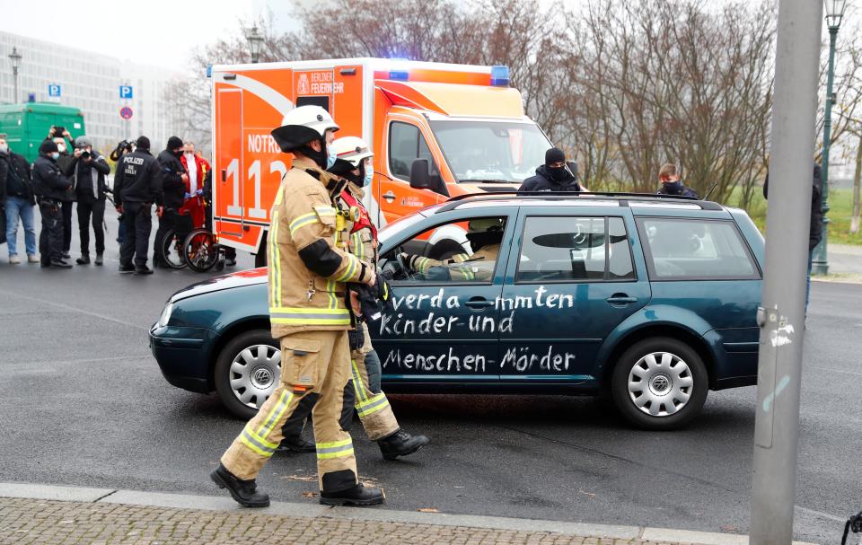 <p>Car crashed into the gate of the office of German Chancellor Angela Merkel </p>REUTERS