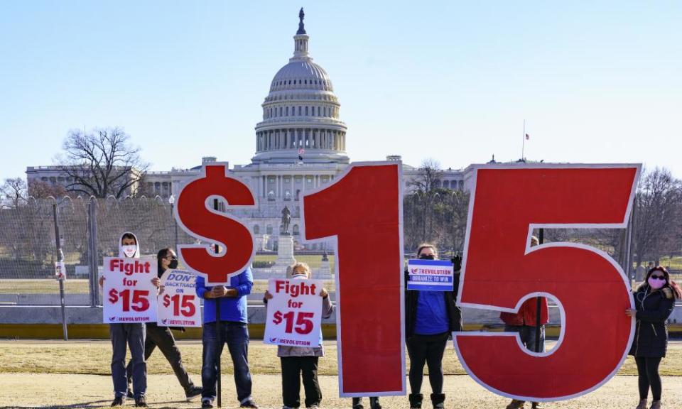 Activists appeal for a $15 minimum wage near the Capitol in Washington, Thursday 25 February 2021.