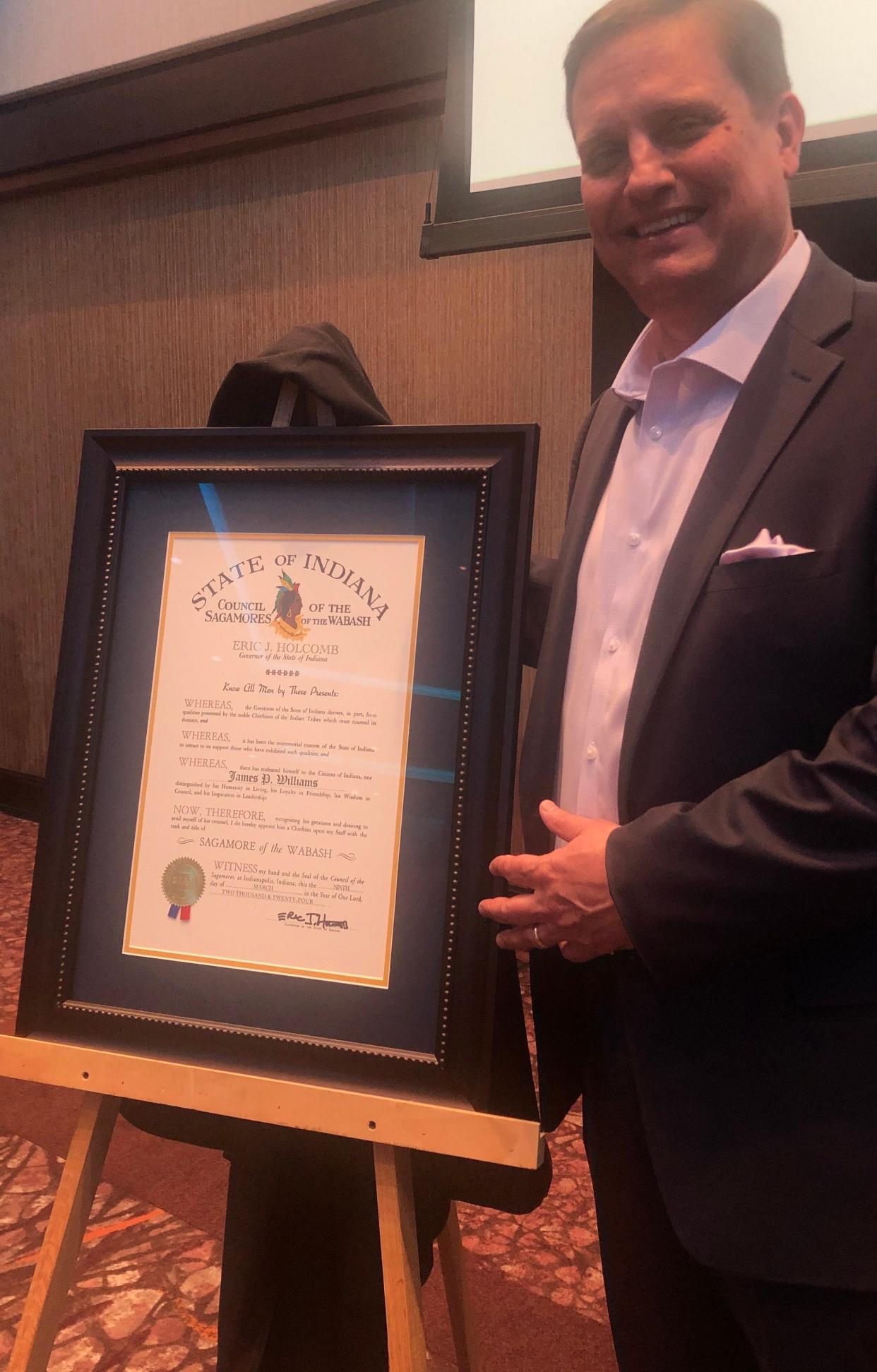 Jim Williams receives the Sagamore of the Wabash award at a recent ceremony at Four Wind Casino's Ribbon Town Conference and Event Center in South Bend.