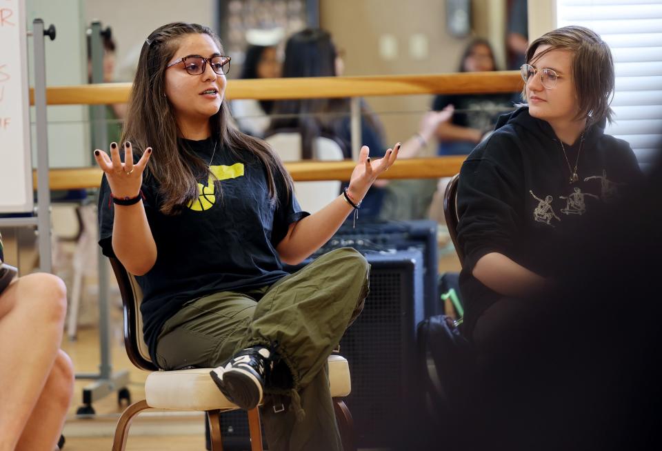 Dania Diaz explains her thoughts as Antaus James listens as they join Hawaiian poet Kealoha Wong at the West Valley Performing Arts Center on Thursday, June 29, 2023. Wong conducted a five-week intensive arts program for high-school and college-aged youth with a special invitation to Pacific Islander, BIPOC and LGBTQ youth from Salt Lake County. | Scott G Winterton, Deseret News