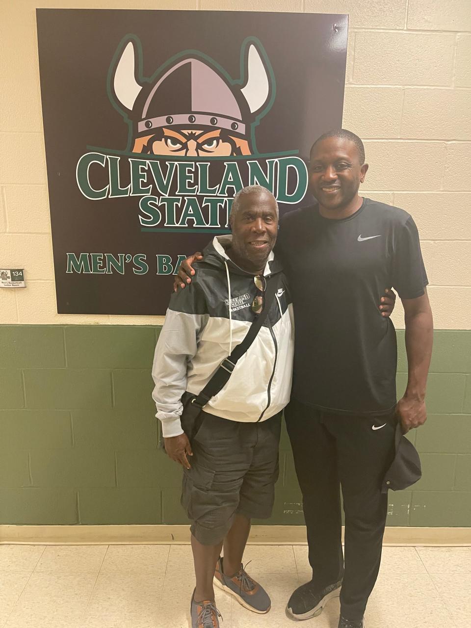Dr. Joe Carr (left) and Dennis Gates (right) post for a photo during Gates' tenure as head coach at Cleveland State University.