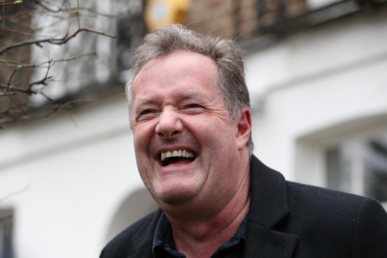 Piers Morgan laughs as he speaks to reporters outside his home in Kensington, central London, the morning after it was announced by broadcaster ITV that he was leaving as a host of Good Morning Britain. Picture date: Wednesday March 10, 2021.