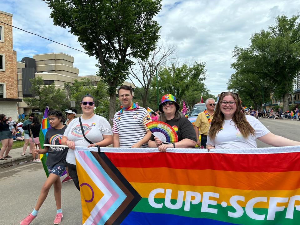 Kent Peterson, middle, marches in the Regina Pride Parade in June. 